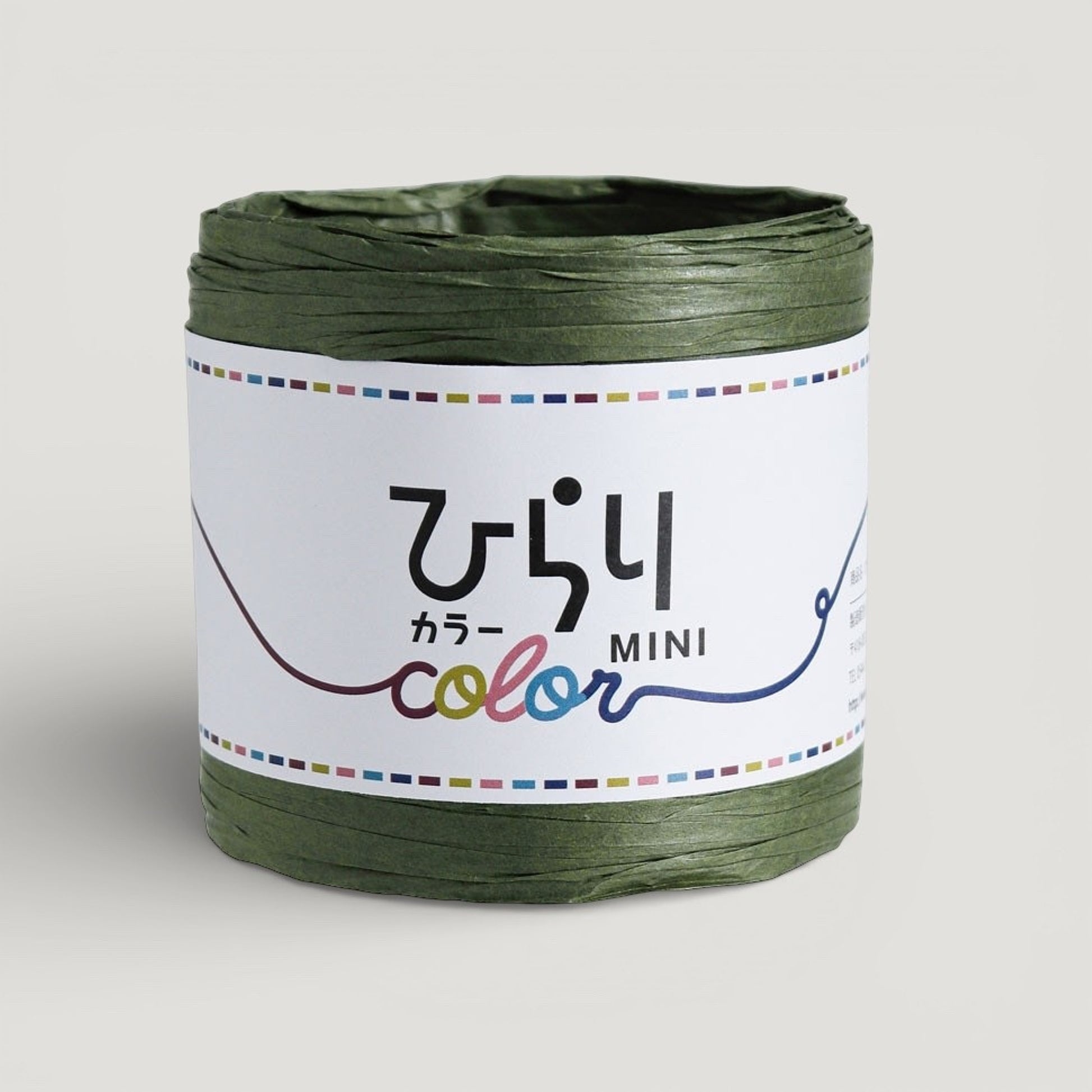 a reel of green colour Japanese paper string