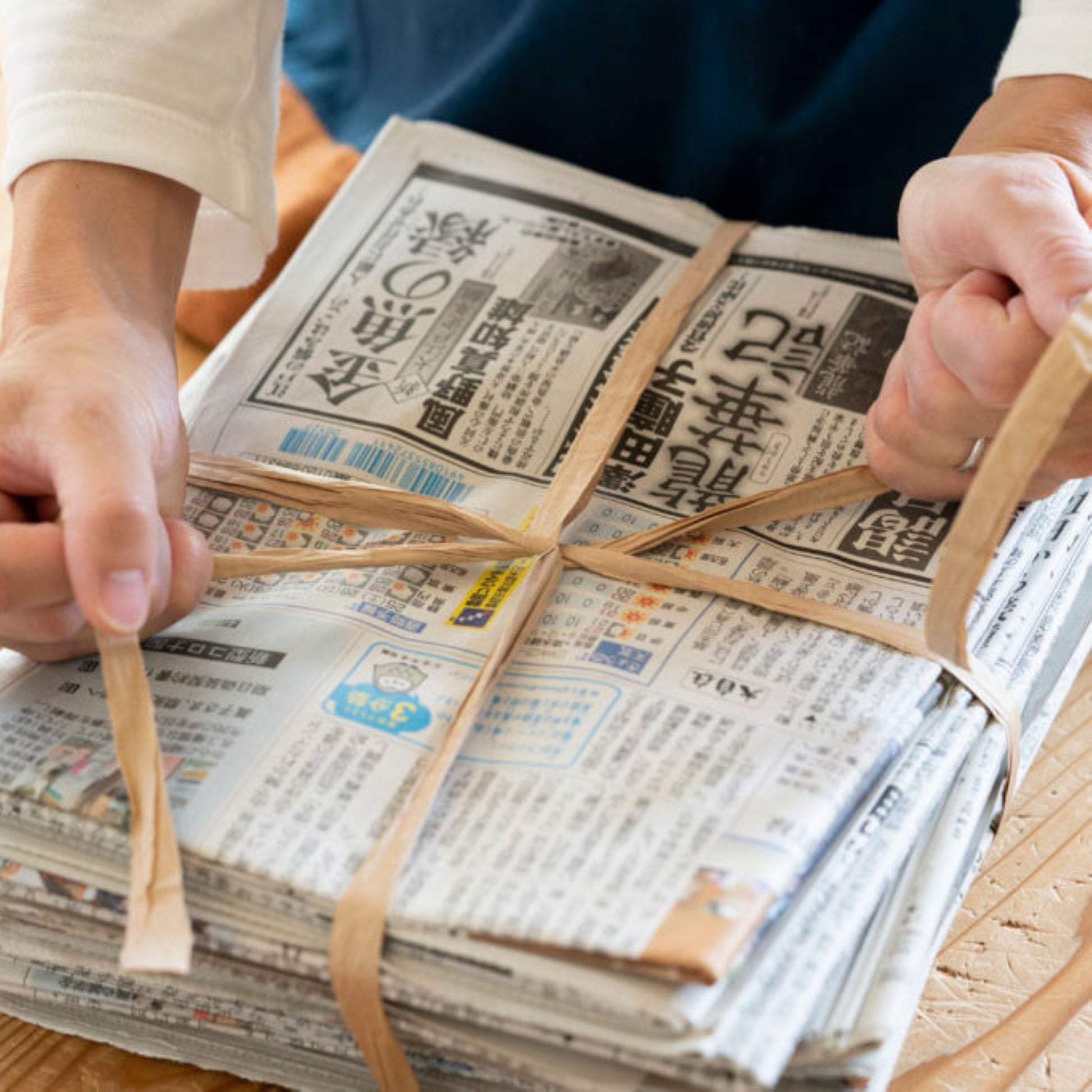 a reel of natural coloured Japanese paper ribbon