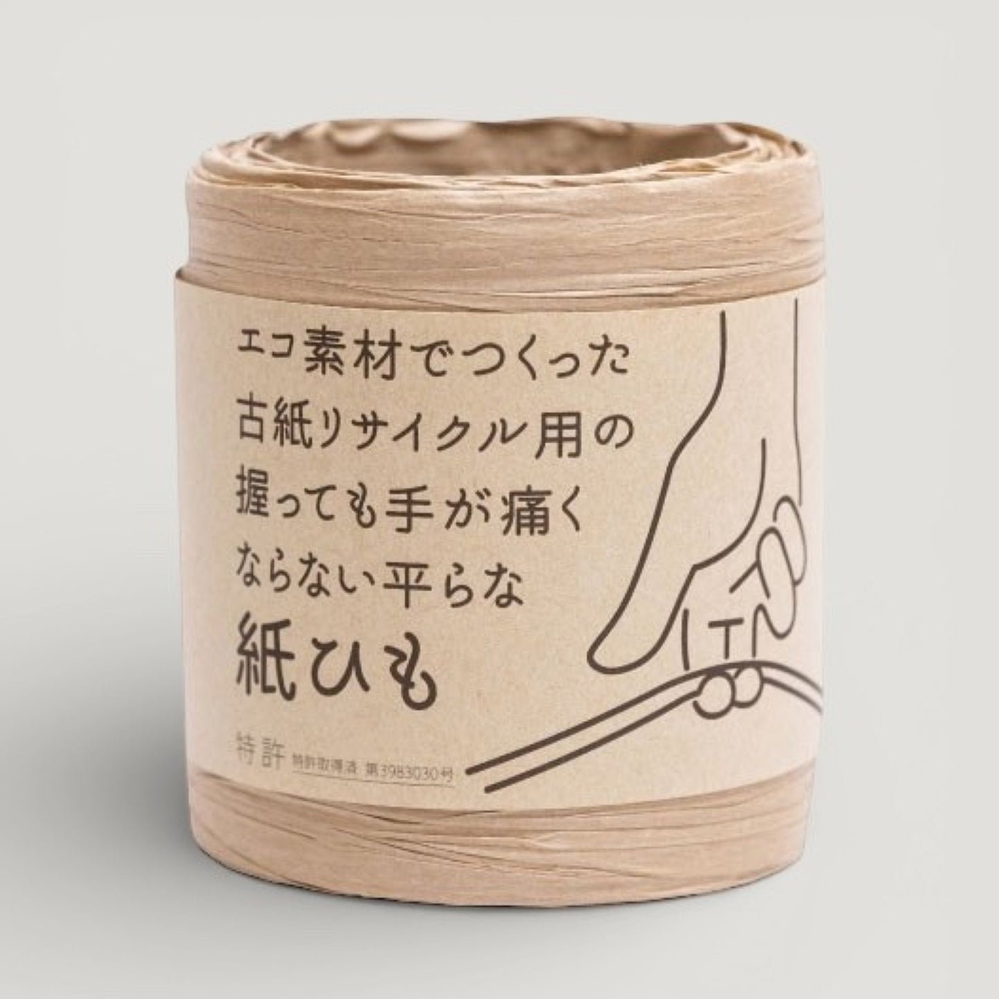 a reel of natural coloured Japanese paper ribbon