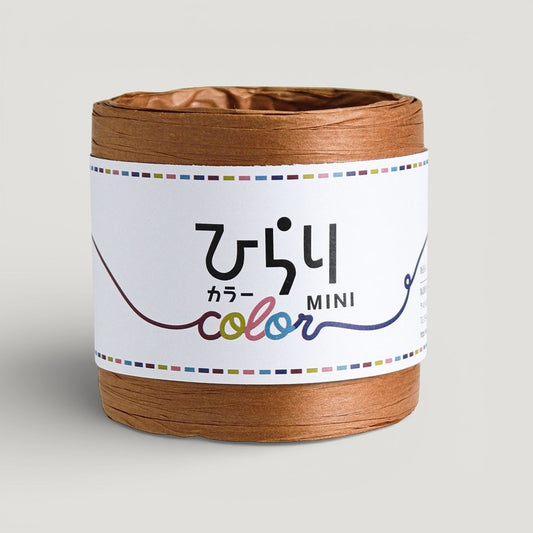 a reel of  tan colour Japanese paper string