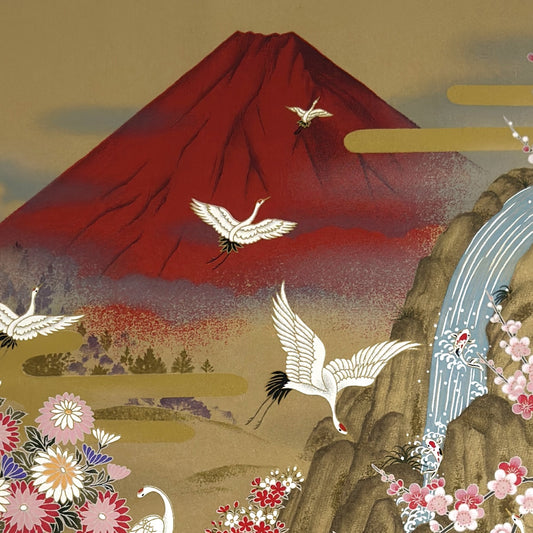 A sheet of Japanese silkscreen printed paper called Sogara which depicts a red mt. fuji with white cranes flying and flowers and rivers. Close up of Mt.Fuji