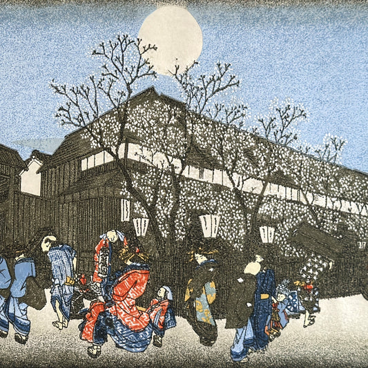 A sheet of Japanese Sogara silkscreen printed paper with 4 images from artwork by Hiroshige.  Close up of a street scene with trees with white blossom