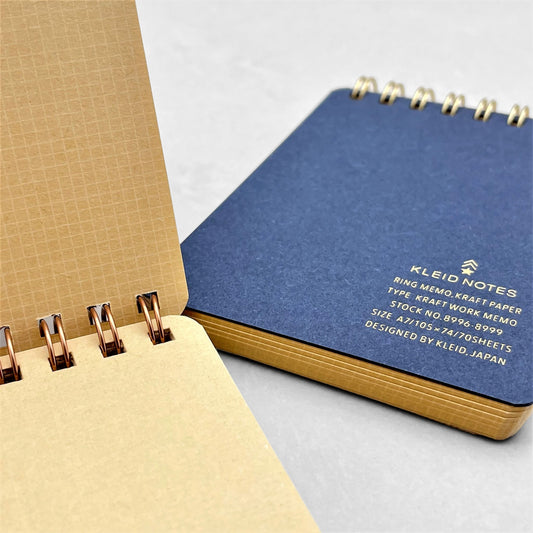 A7 memo ring-bound notepad, cover is plain navy with gold dual rings by Japanese brand Kleid