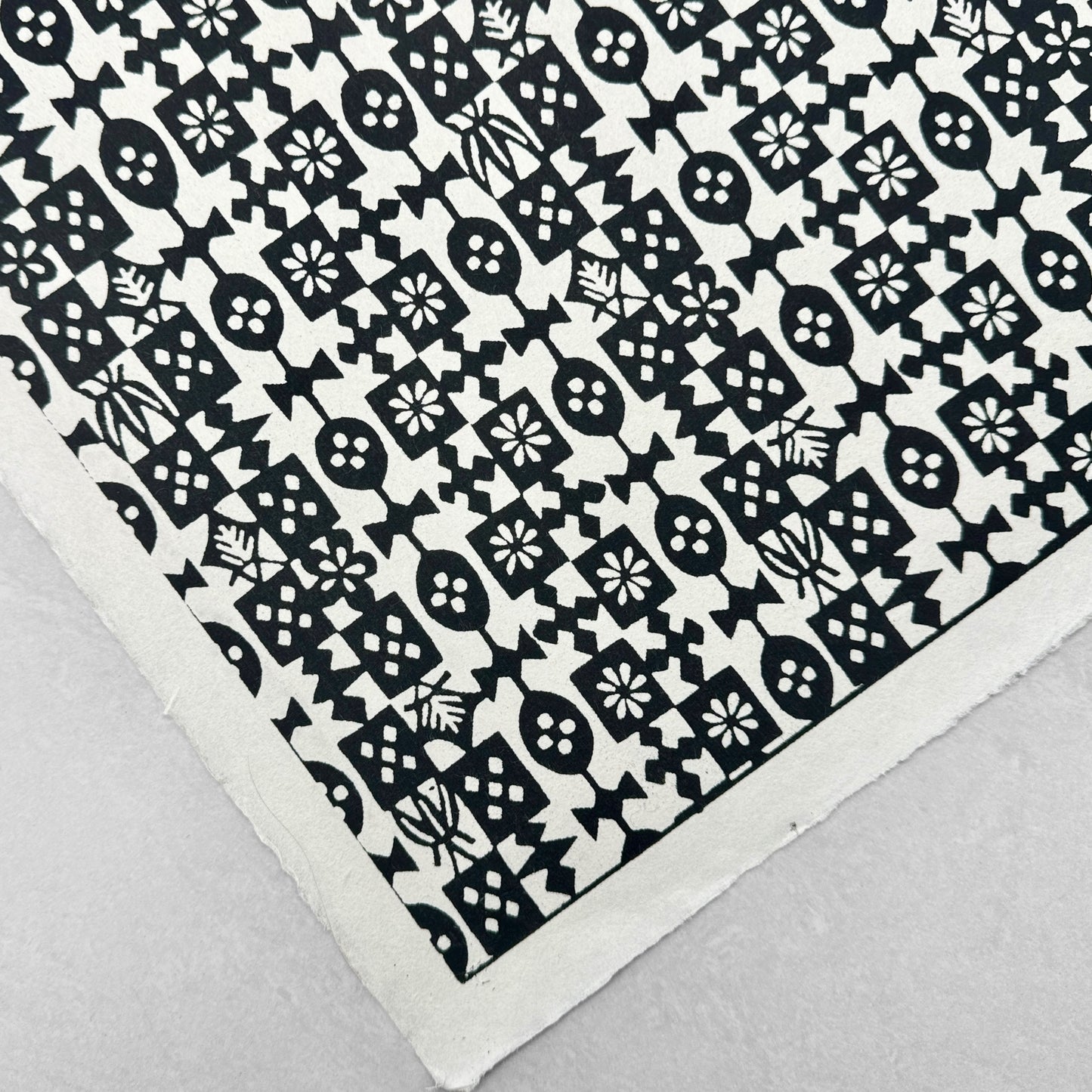 Japanese stencil-dyed, katazome-shi patterned paper. Black and white geometric design. Flat view