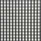 a sheet of wrapping paper with a black and white gingham pattern