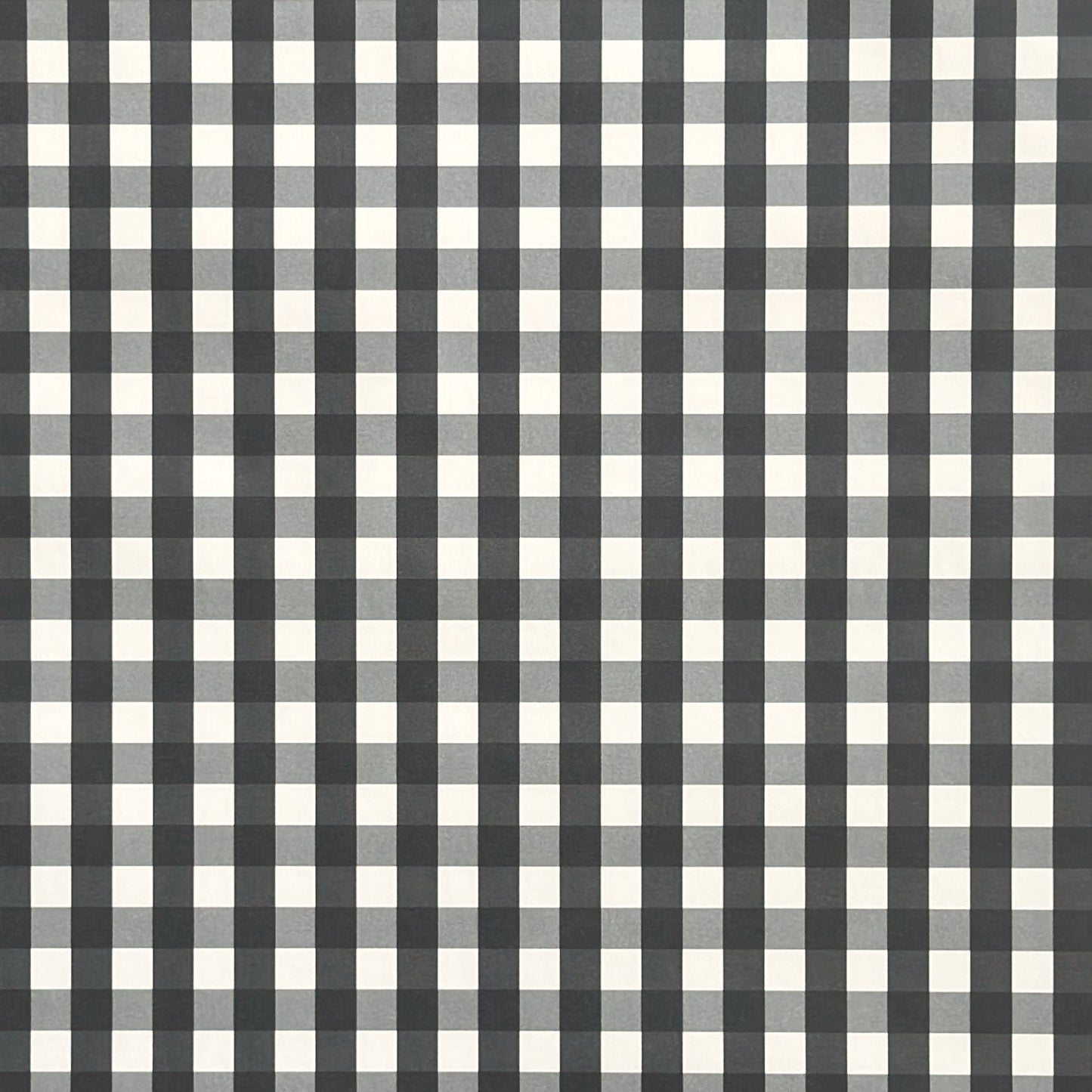 a sheet of wrapping paper with a black and white gingham pattern