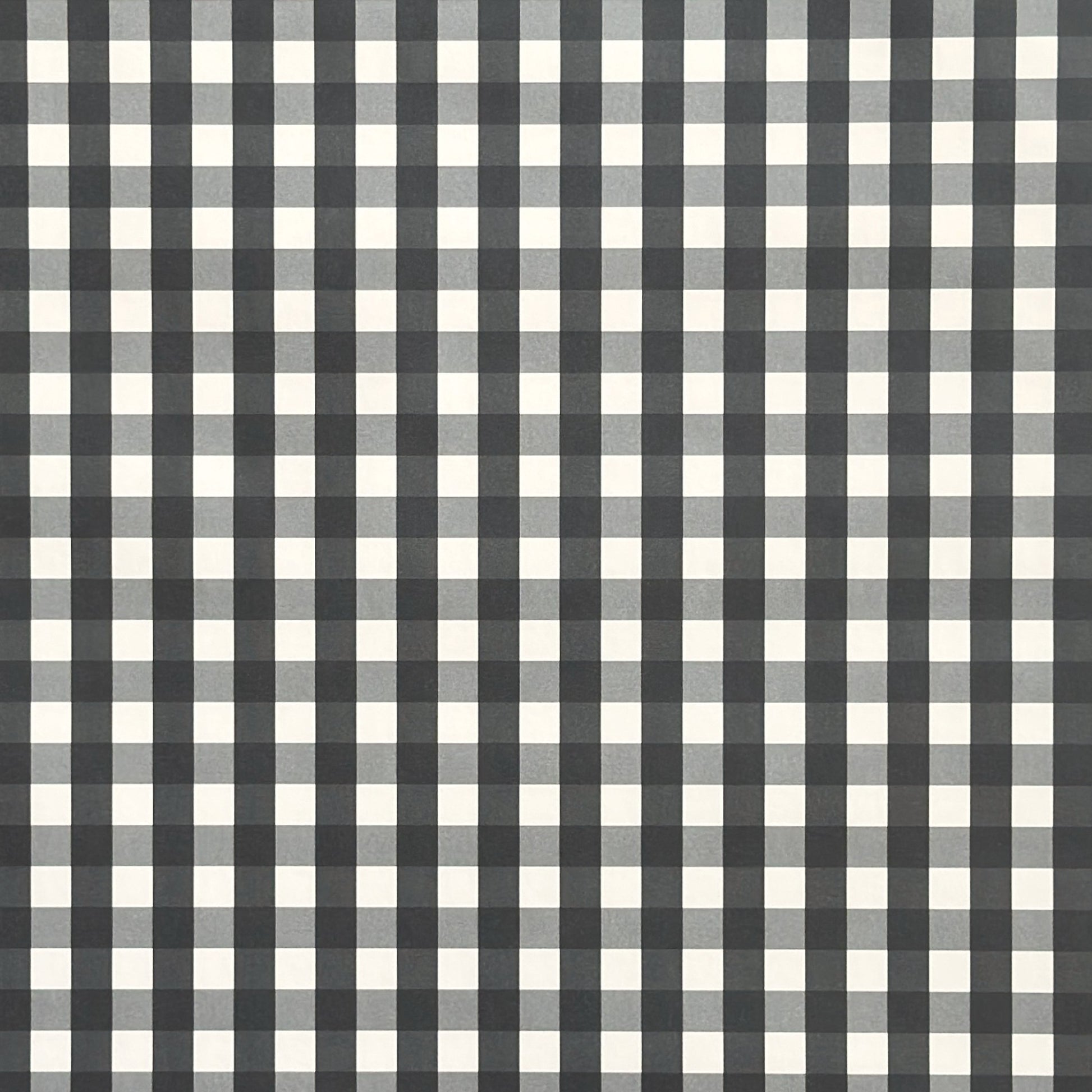 a sheet of wrapping paper with a black and white gingham pattern