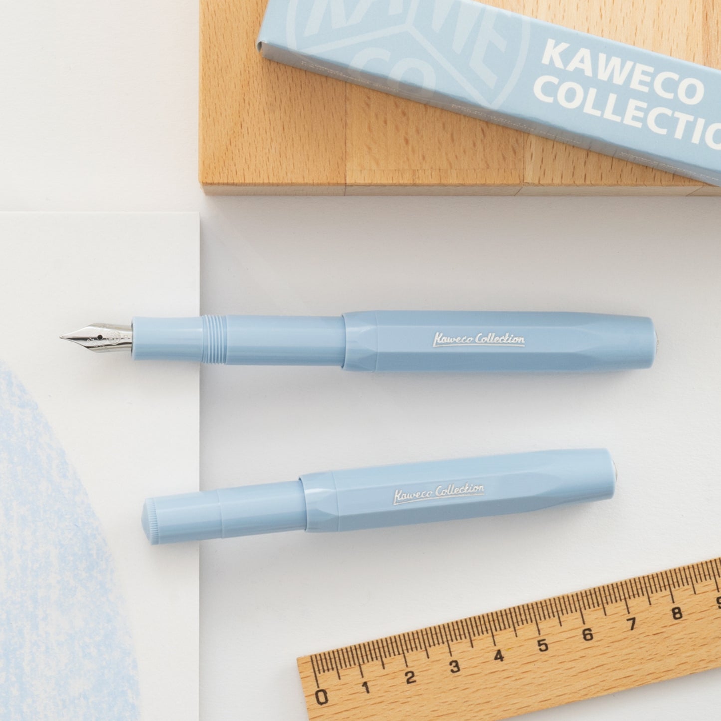 Kaweco Collection Sport fountain pen in mellow blue, pictured with cap posted and presentation box.