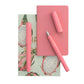 Kaweco Perkeo fountain pen in peony blossom pink colour, pictured with cap posted, with a pink notebook