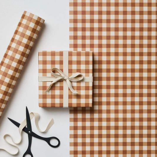 a sheet of wrapping paper with a cinnamon brown gingham pattern
