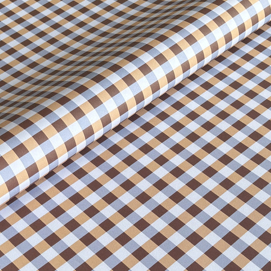 a sheet of wrapping paper with a gingham pattern in brown, beige and light blue