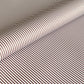 a sheet of wrapping paper with a narrow stripe design in dark brown and cream