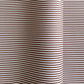 a sheet of wrapping paper with a narrow stripe design in dark brown and cream