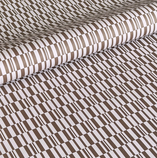 a sheet of wrapping paper with a brown line pattern in brown and beige