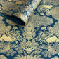 Nepalese handmade decorative lokta paper sheet with a detailed design of trees and flowers in gold metallic screen printed on a midnight blue lokta paper.