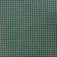 a sheet of Nepalese lokta paper with a lime green and pink grid pattern on dark green handmade paper. Close up