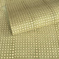 a sheet of Nepalese batik lokta paper in sage green with a repeat white dot design. Pictured gently rolled