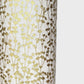 nepalese hand printed lokta paper with a small gold abstract gingko design on white lokta paper. close up