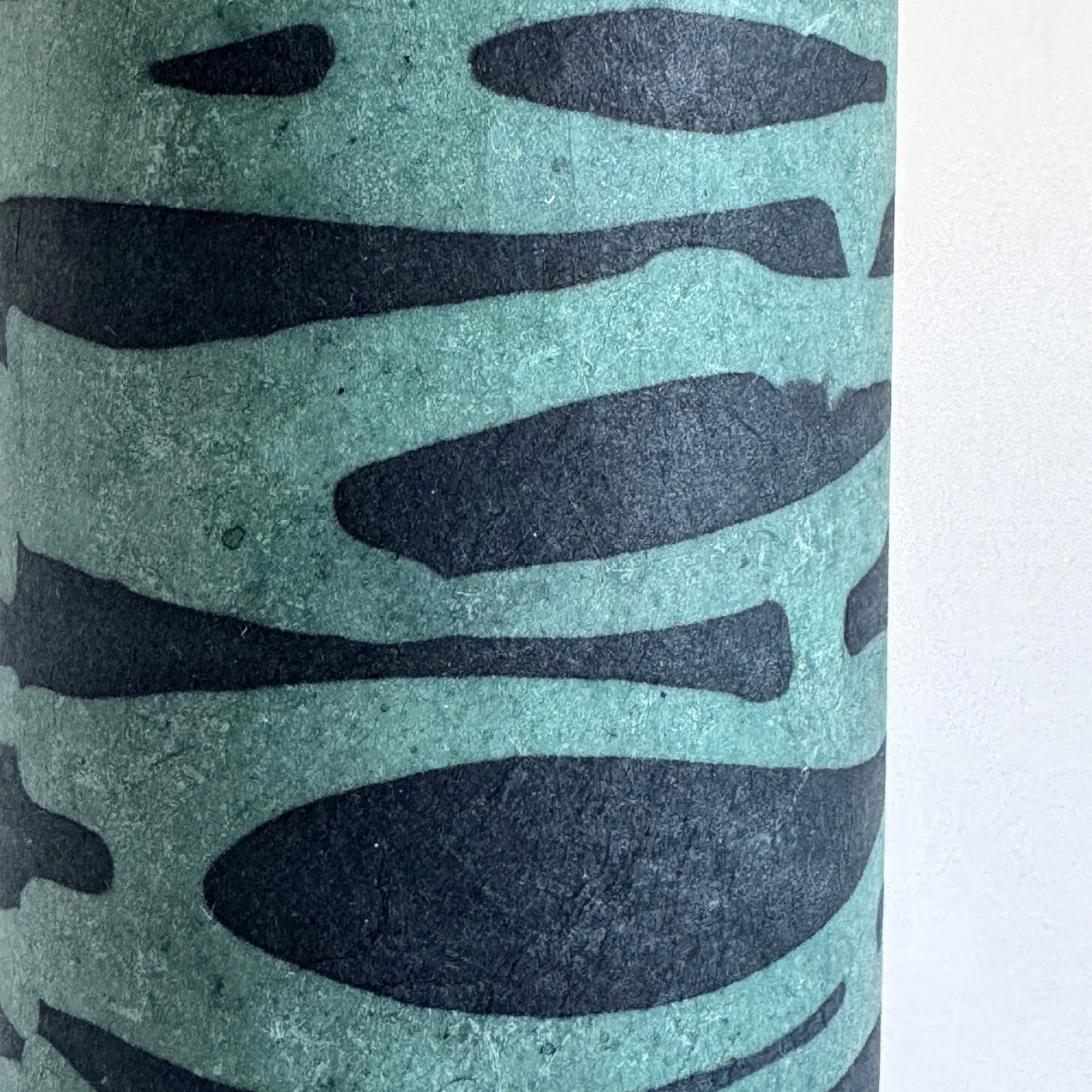Nepalese handmade decorative lokta paper sheet with an abstract pattern in aqua and teal.  Batik dyed using carved wooden blocks.