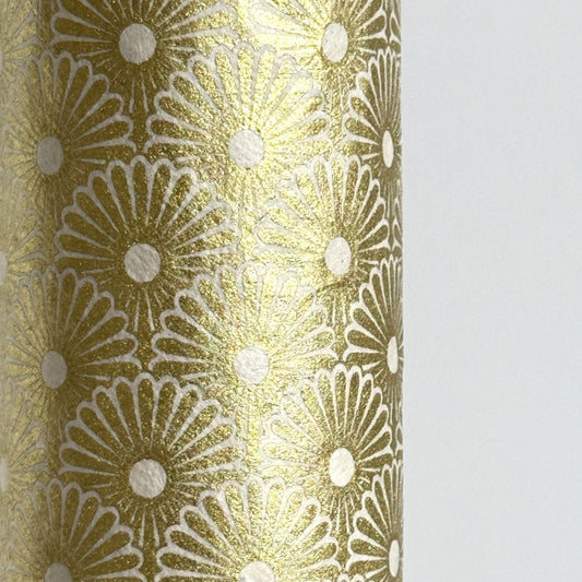 Nepalese handmade decorative lokta paper sheet with a gold metallic repeat floral pattern screen printed on an ivory lokta paper.