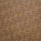 Nepalese handmade decorative lokta paper sheet with a fine lined black knots pattern screen printed on a brown lokta paper.