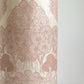 Nepalese handmade decorative lokta paper sheet with a detailed design of trees and flowers in blush pink screen printed on an ivory lokta paper.