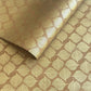 Nepalese handmade decorative lokta paper sheet with a gold metallic leaf pattern screen printed on a tan lokta paper.