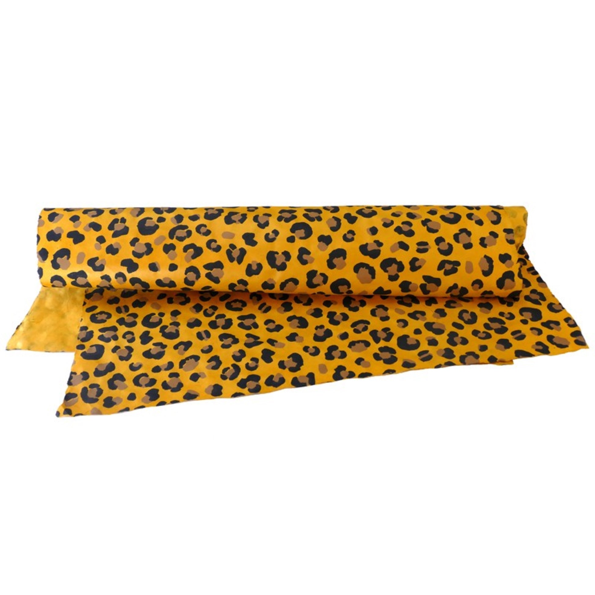 Nepalese handmade decorative lokta paper sheet with an animal print design in two colours, tan and black, screen printed on a yellow lokta paper. Full sheet of paper pictured