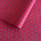 Nepalese handmade decorative lokta paper sheet with a lilac palm leaf design screen printed on a fuchsia pink lokta paper.