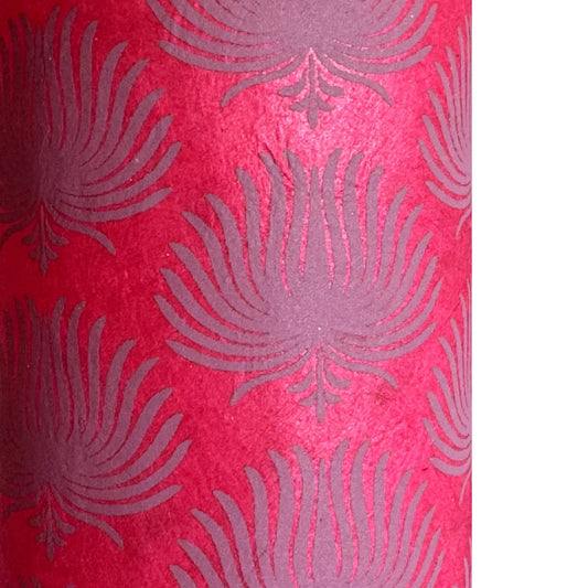 Nepalese handmade decorative lokta paper sheet with a lilac palm leaf design screen printed on a fuchsia pink lokta paper.