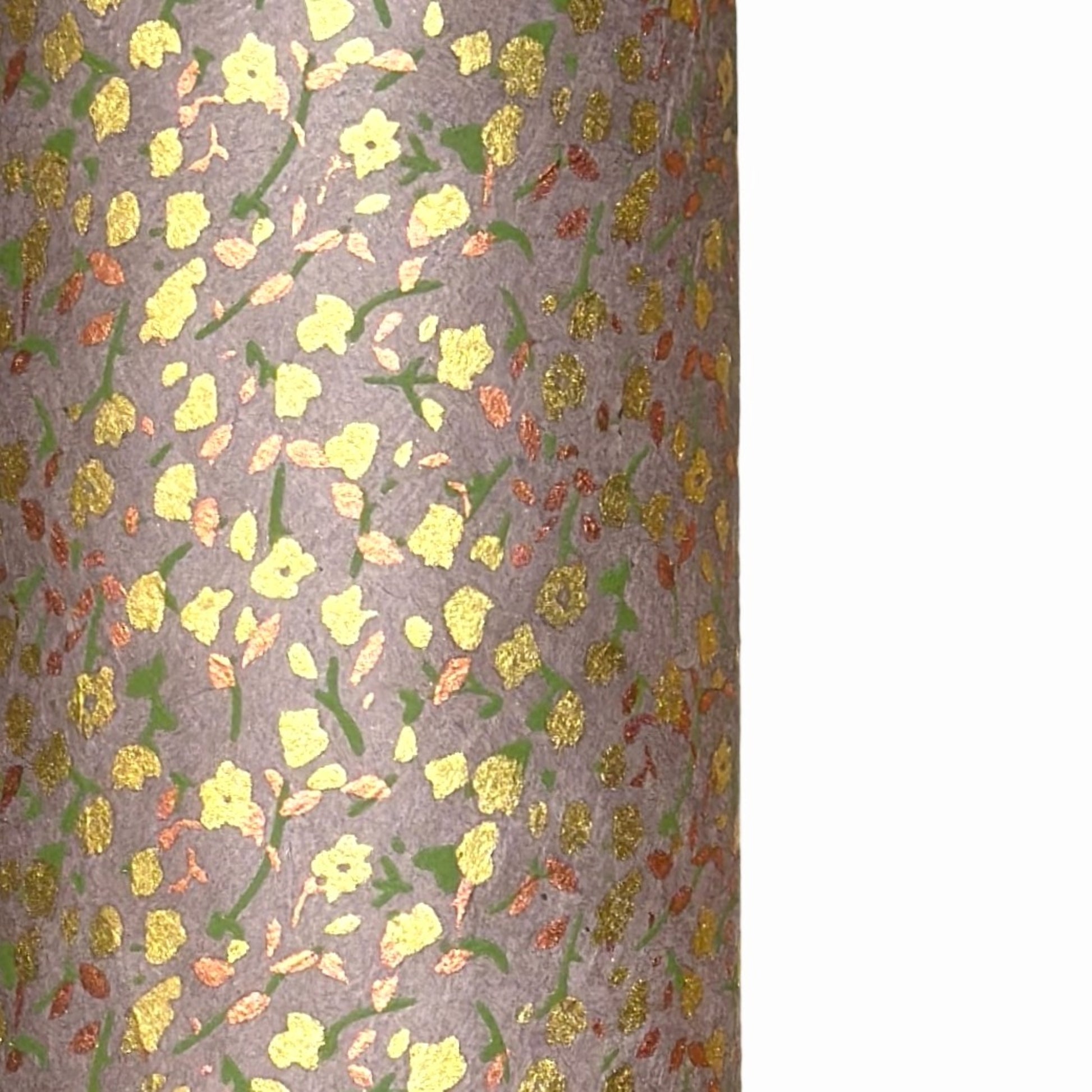 A delicate floral pattern in gold, blush and green screen-printed by hand on muted lavender lokta paper.