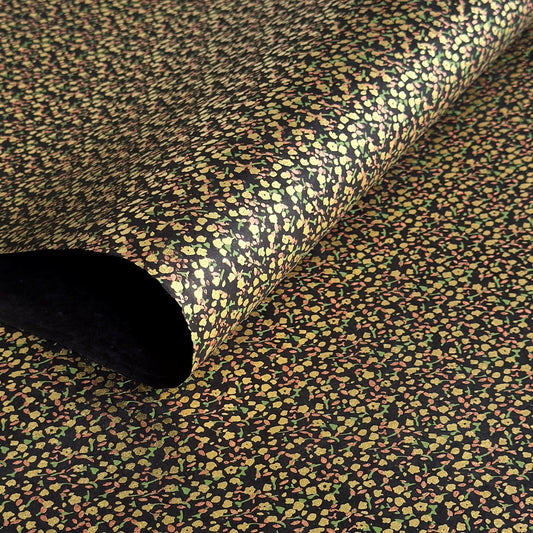A delicate floral pattern in gold, blush and green screen-printed by hand on black lokta paper.