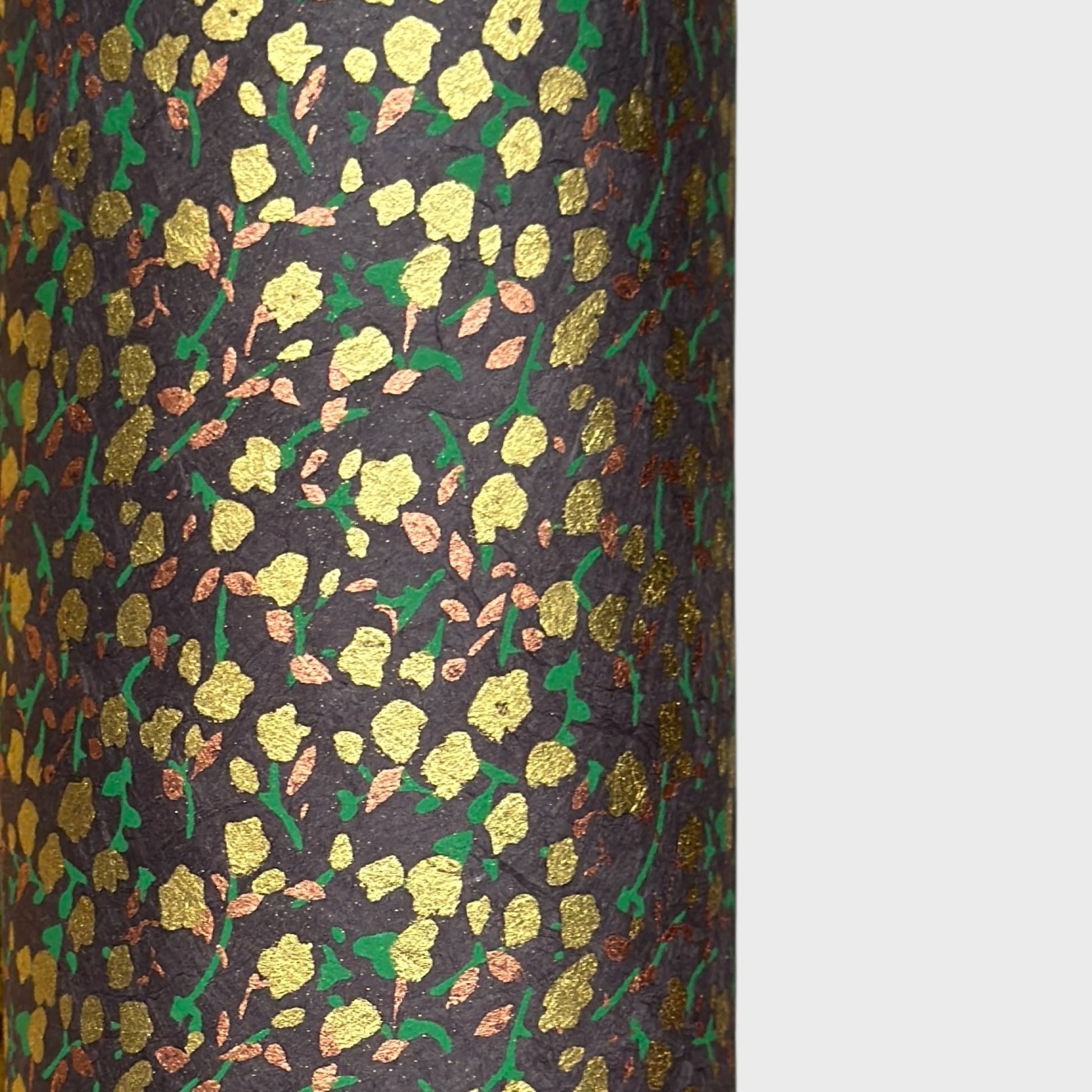 A delicate floral pattern in gold, blush and green screen-printed by hand on slate lokta paper.