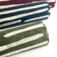 Nepalese handmade decorative lokta paper sheet with a stripe pattern in mossy and white.  Batik dyed using carved wooden blocks. Rolled