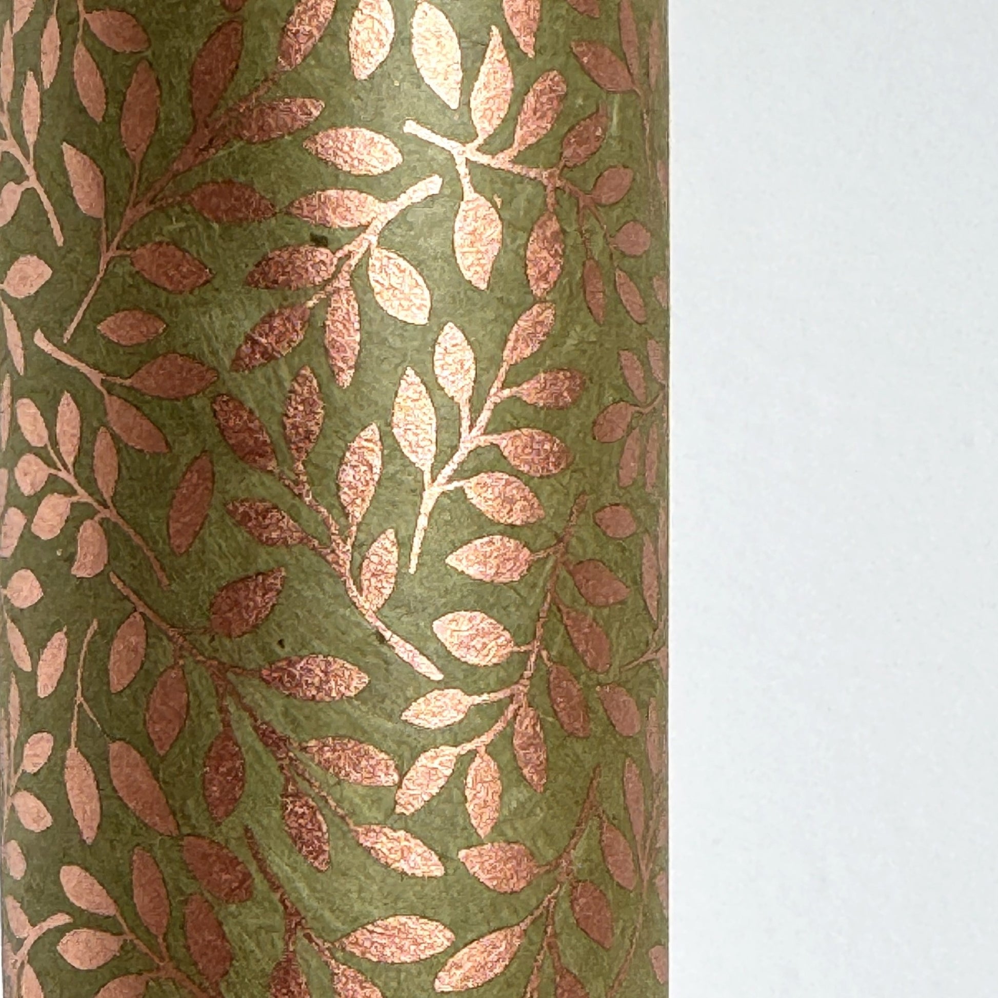 Nepalese handmade decorative lokta paper sheet with a metallic copper willow design screen printed on a dusty moss green lokta paper.