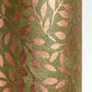 Nepalese handmade decorative lokta paper sheet with a metallic copper willow design screen printed on a dusty moss green lokta paper. Close up