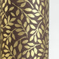 Nepalese handmade decorative lokta paper sheet with a metallic gold willow design screen printed on a dusty grape lokta paper.