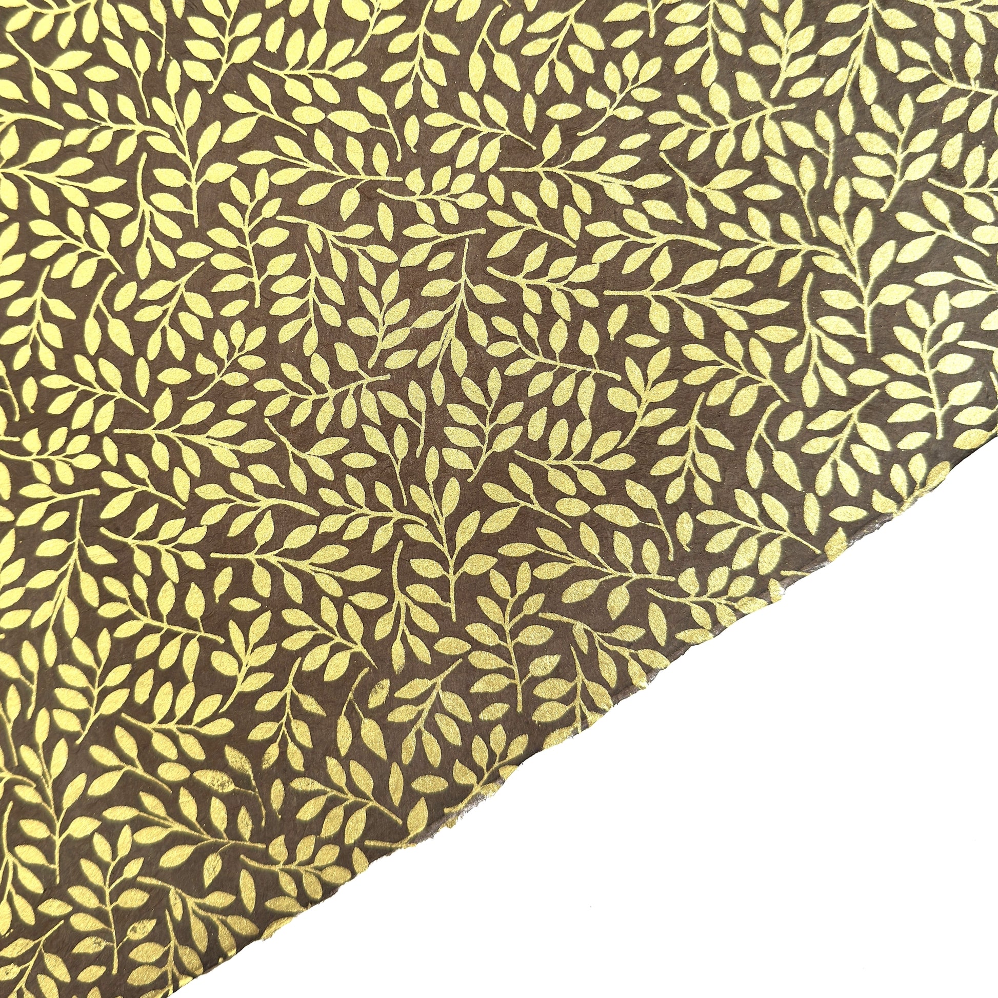 Nepalese handmade decorative lokta paper sheet with a metallic gold willow design screen printed on a dusty grape lokta paper.