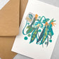 Greetings card by Megan Fartharly of a bunch of collaged peas, with envelope
