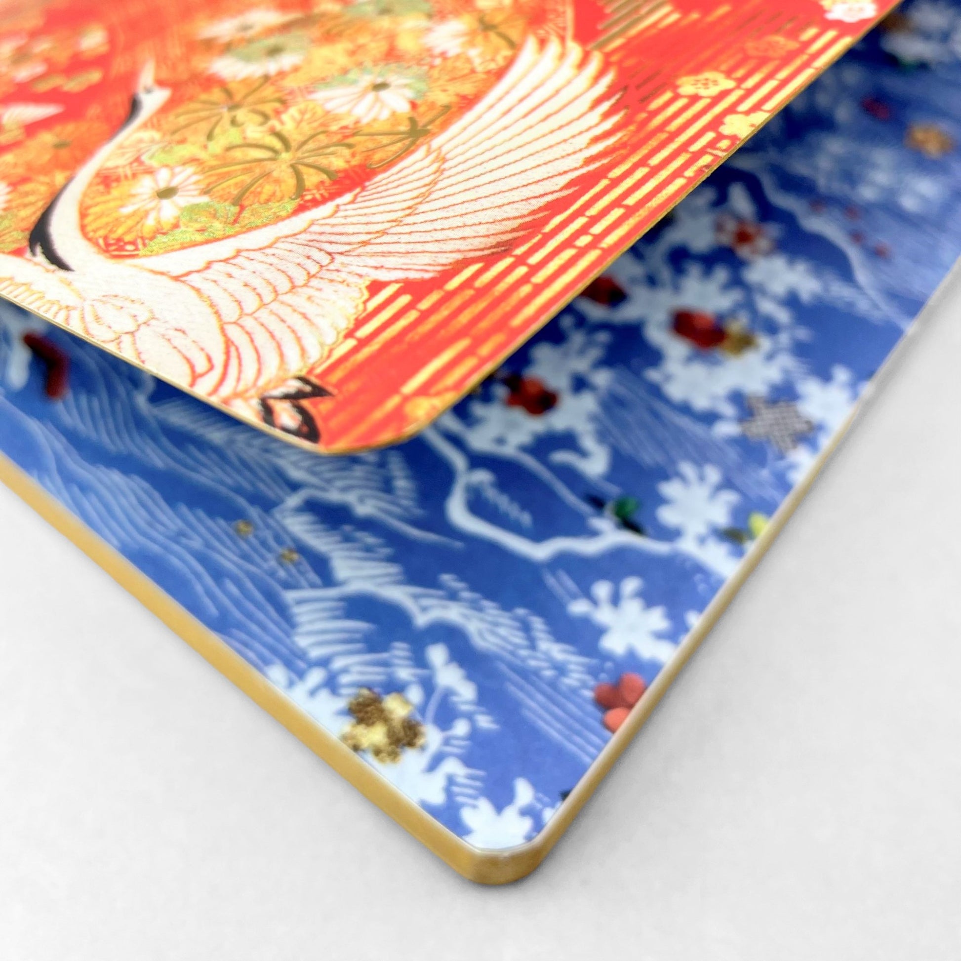 A5 lined notebook with a japanese cover design with white swans on an orange background