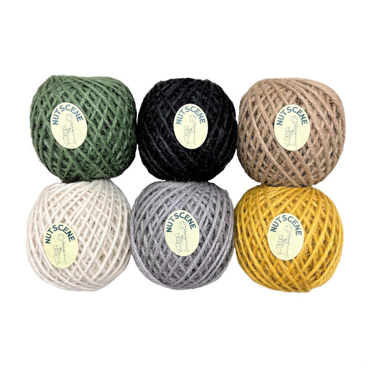 Set of 6 balls of jute twine by Nutscene.  Colours are green, black, natural, white, grey and mustard.