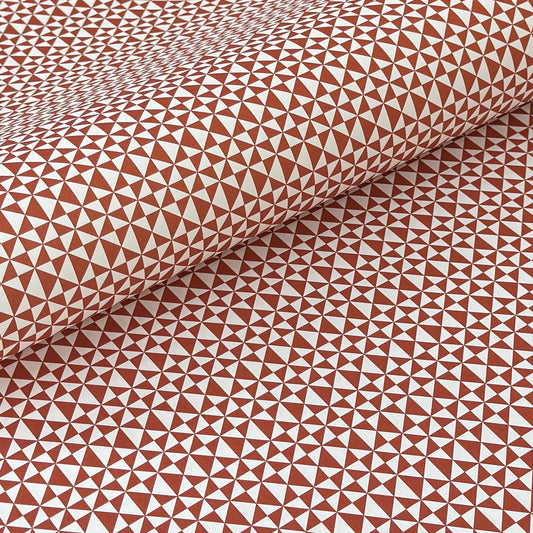 wrapping paper sheet by Ola Studio with a geometric triangle pattern in brick red on white