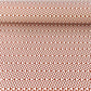 wrapping paper sheet by Ola Studio with a geometric triangle pattern in brick red on white