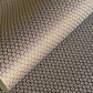 wrapping paper with an abstract tiny stars pattern in chestnut brown and white by Ola Studio