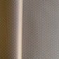 wrapping paper with an abstract tiny stars pattern in chestnut brown and white by Ola Studio