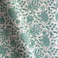 wrapping paper with repeat botanical floral pattern in light aqua by Paper Mirchi