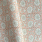 wrapping paper with repeat botanical pattern in light coral pink by Paper Mirchi