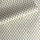 Wrapping paper with block print small flower motif in yellow and green, white background by Paper Mirchi
