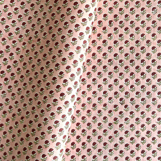 hand block printed patterned paper by Paper Mirchi, red daisy print on pink background