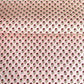 hand block printed patterned paper by Paper Mirchi, red daisy print on pink background